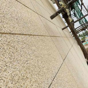 辽宁 黄金麻花岗岩荔枝面外墙干挂石材效果示例