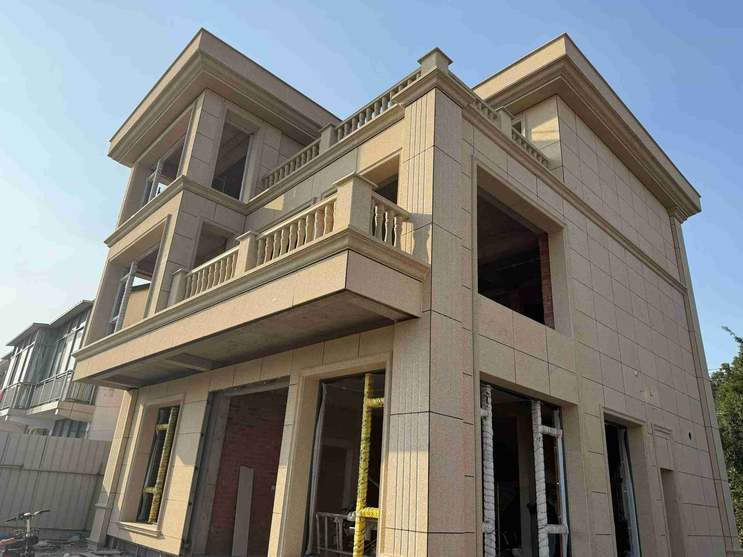 辽宁 黄金麻花岗岩石材荔枝面外墙干挂效果展示